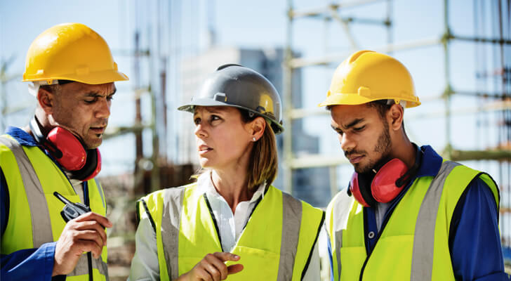 Proup of professionals wearing hard hats