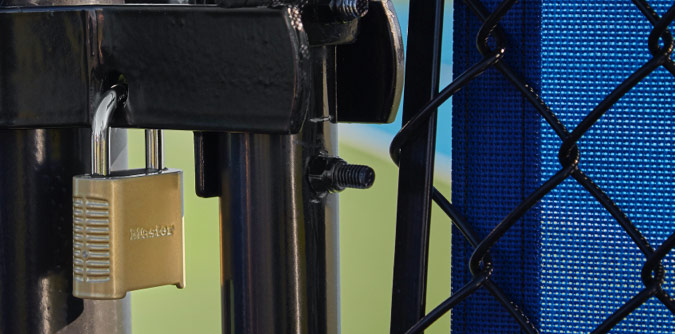 Padlock securing a fence